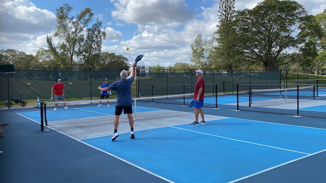 view of tennis court with basketball court