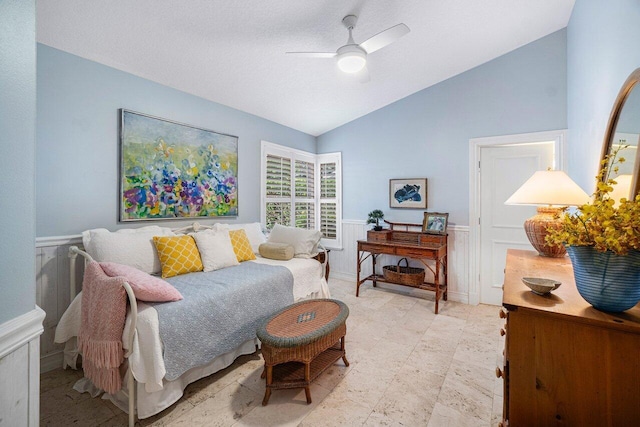 bedroom featuring ceiling fan and vaulted ceiling