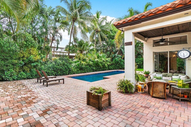 414 NW 13th St, Delray Beach, FL 33444 - swimming pool featuring ceiling fan, a patio, and an outdoor living space
