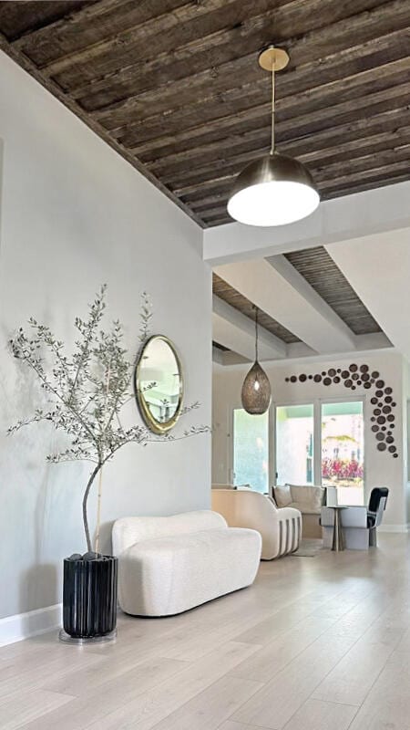 interior space featuring wooden ceiling and hardwood / wood-style flooring