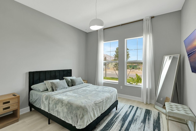 bedroom featuring light hardwood / wood-style floors