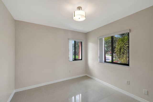 empty room featuring light tile patterned floors