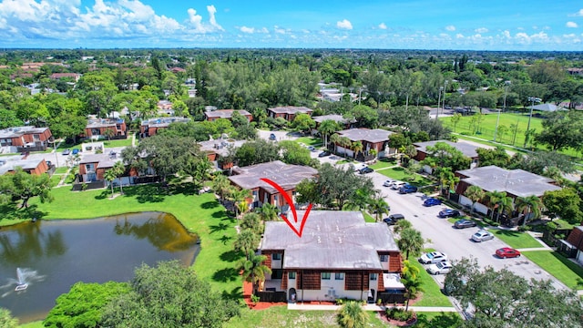 drone / aerial view with a water view