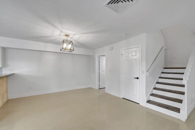 interior space featuring an inviting chandelier