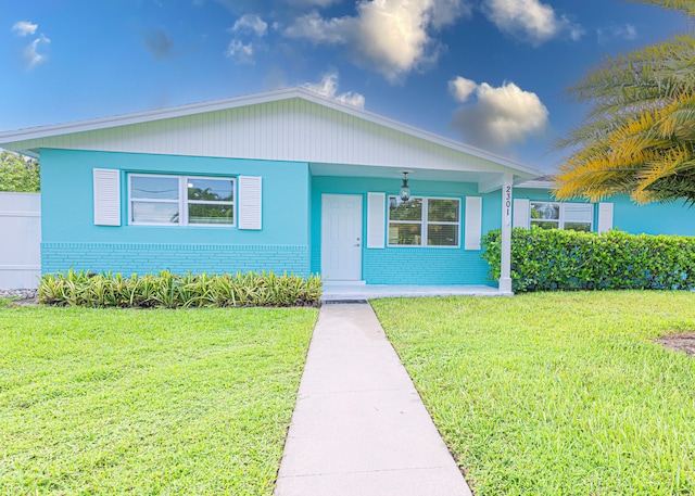 view of front of home with a front yard