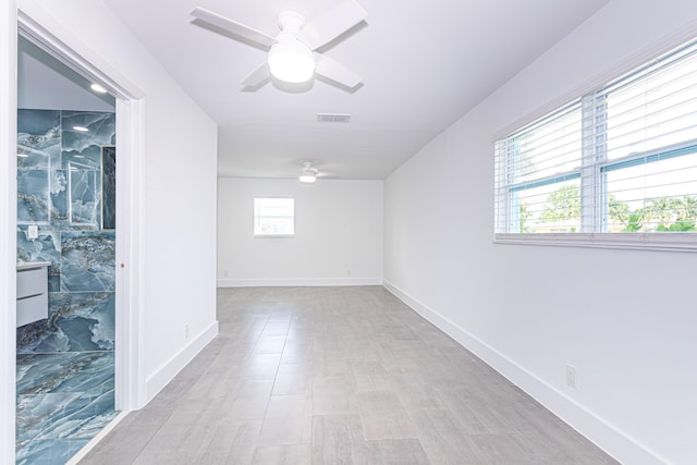 empty room with ceiling fan