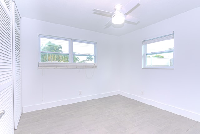 spare room with ceiling fan