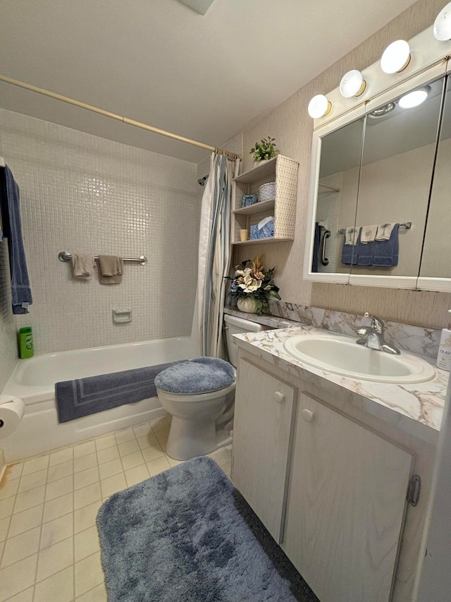 full bathroom with shower / tub combo with curtain, tile patterned flooring, vanity, and toilet