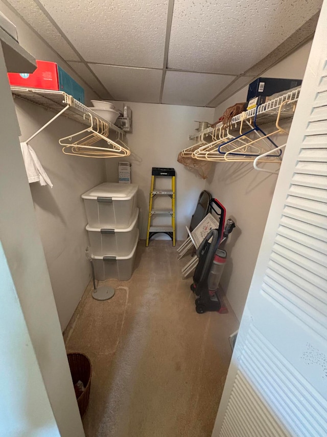 spacious closet featuring a paneled ceiling