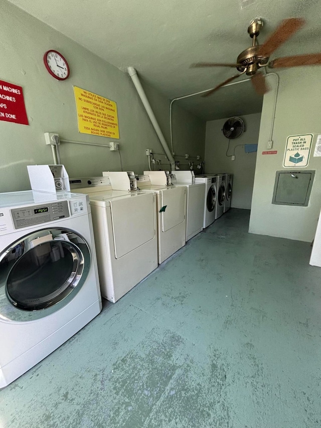 clothes washing area featuring ceiling fan and separate washer and dryer