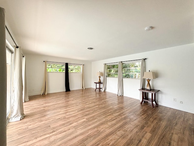 empty room with light wood-type flooring