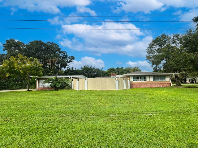 ranch-style house with a front yard