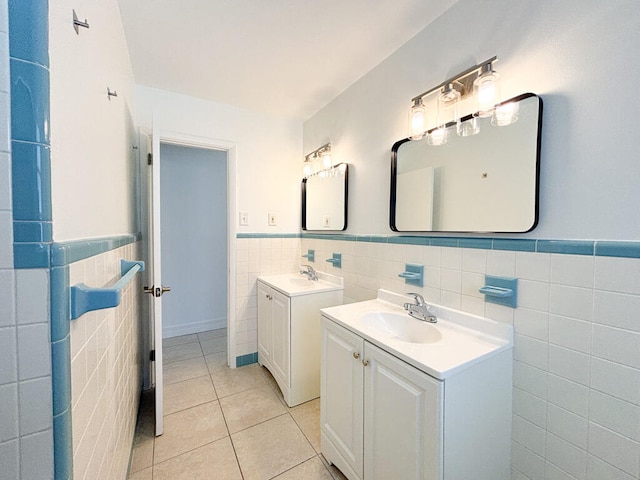 bathroom featuring vanity, tile walls, and tile patterned floors