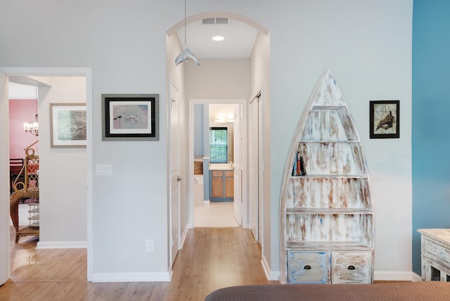 hall featuring light hardwood / wood-style flooring