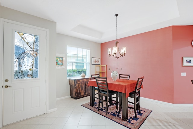 dining area with a healthy amount of sunlight and an inviting chandelier