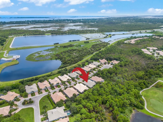 drone / aerial view with a water view