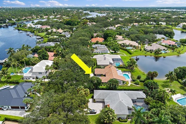 bird's eye view featuring a residential view and a water view