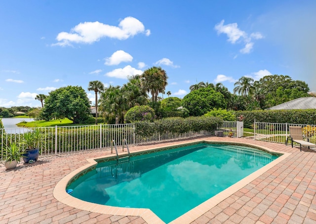 view of swimming pool featuring a patio