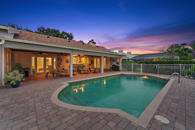 rear view of property with a yard