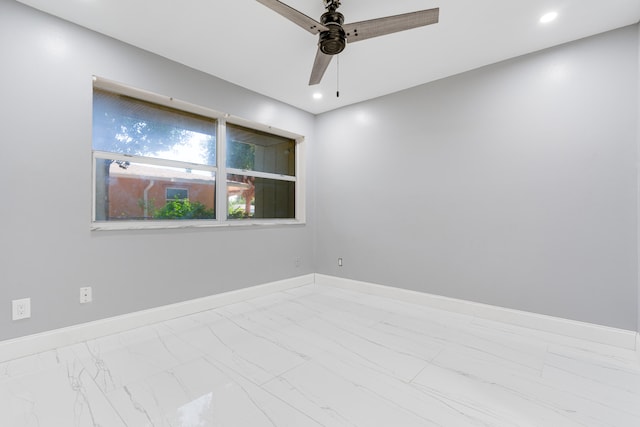 unfurnished room with ceiling fan