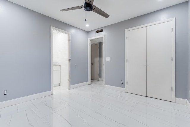 unfurnished bedroom featuring ceiling fan and a closet