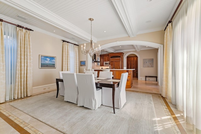 dining room with light tile patterned flooring, wood ceiling, beam ceiling, a chandelier, and crown molding