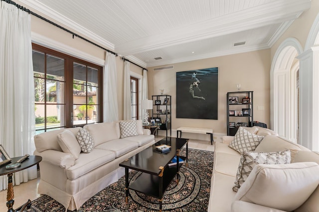 tiled living room with crown molding and beamed ceiling