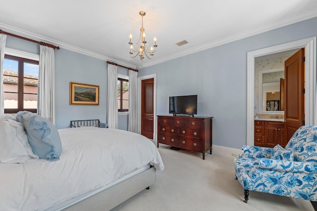 carpeted bedroom featuring multiple windows, crown molding, ensuite bath, and a chandelier