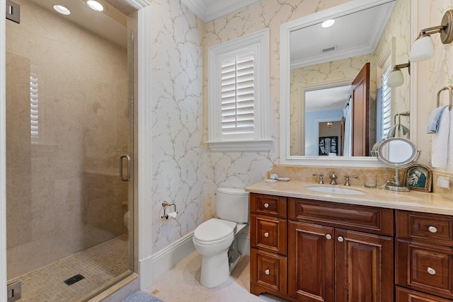 bathroom with ornamental molding, walk in shower, vanity, and toilet