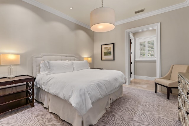 bedroom featuring crown molding