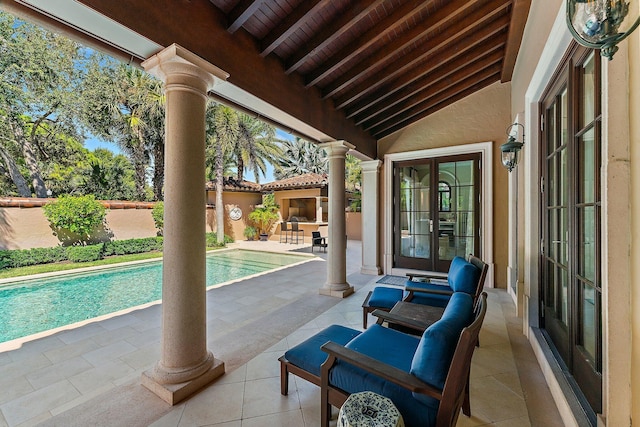 view of pool featuring a patio