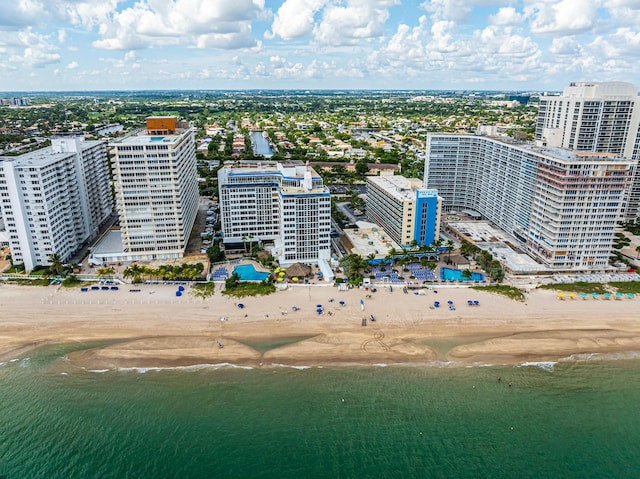 aerial view with a beach view and a water view