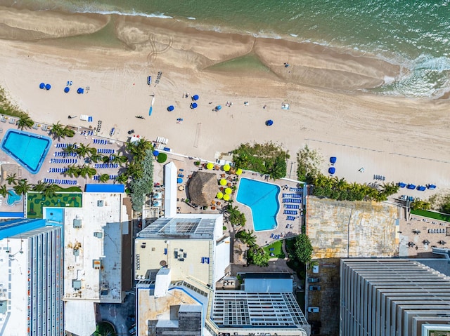 aerial view featuring a water view and a beach view