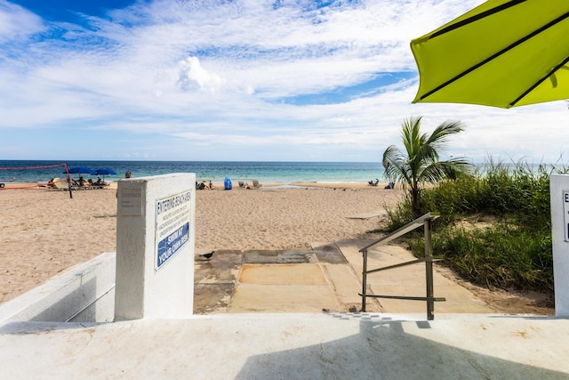 water view featuring a beach view