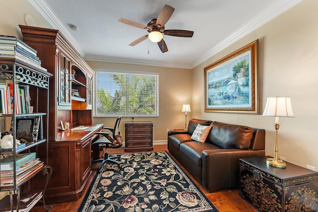 home office featuring wood finished floors, a ceiling fan, and ornamental molding