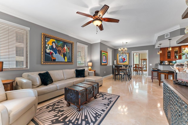 living area with visible vents, baseboards, ornamental molding, and ceiling fan with notable chandelier