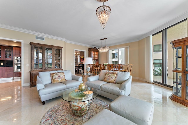 living room with a notable chandelier, baseboards, crown molding, and visible vents