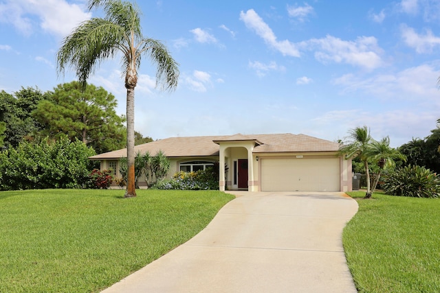 ranch-style house featuring a garage and a front yard