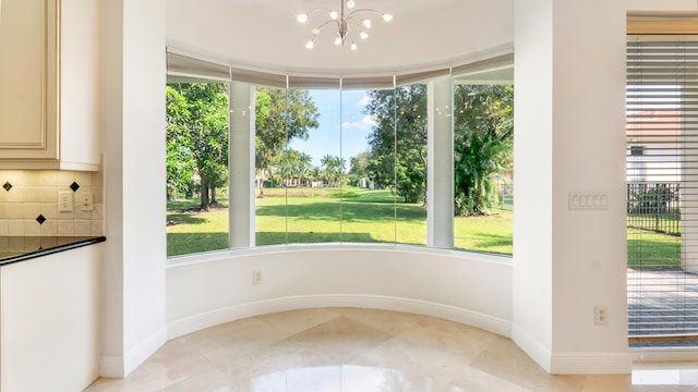 unfurnished sunroom featuring a healthy amount of sunlight