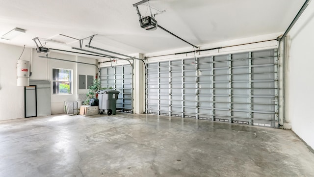 garage featuring a garage door opener and electric panel