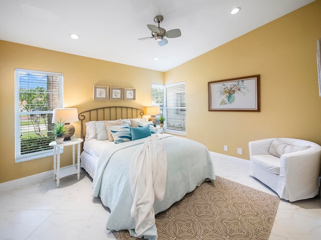 bedroom featuring lofted ceiling and ceiling fan