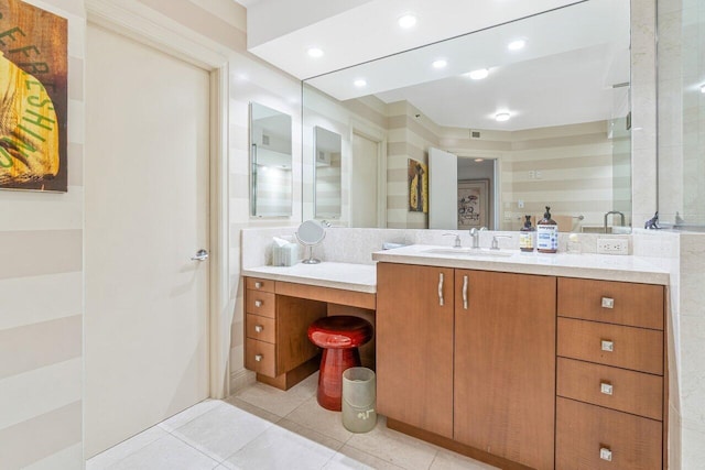 bathroom with vanity and tile patterned flooring