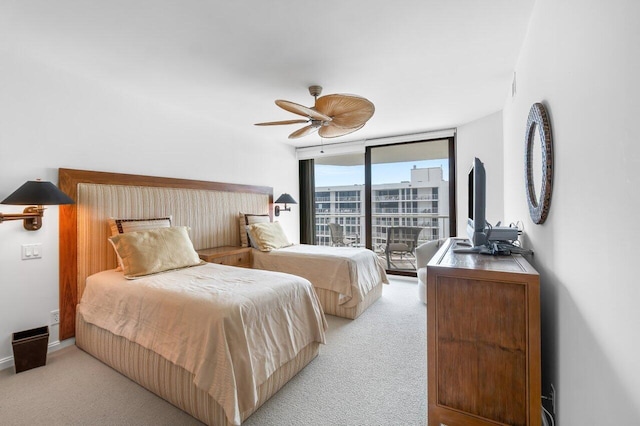 bedroom featuring light carpet, access to outside, and ceiling fan