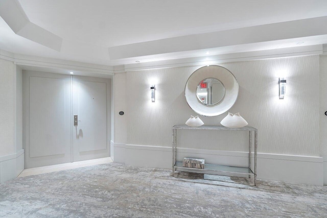 bathroom with a raised ceiling