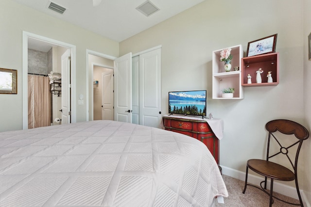 carpeted bedroom featuring a closet