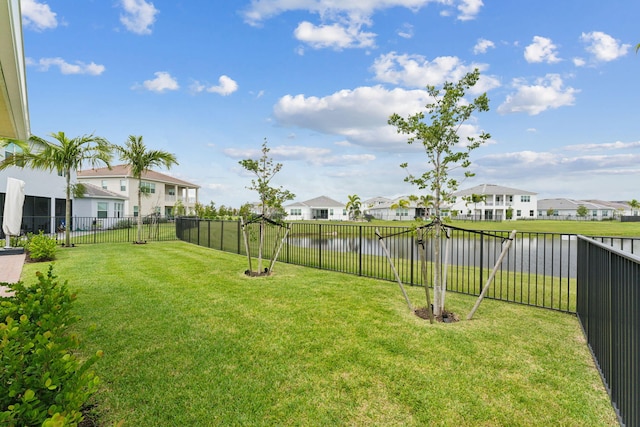 view of yard with a water view