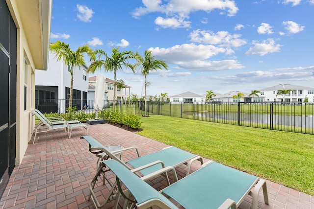 view of patio featuring a water view