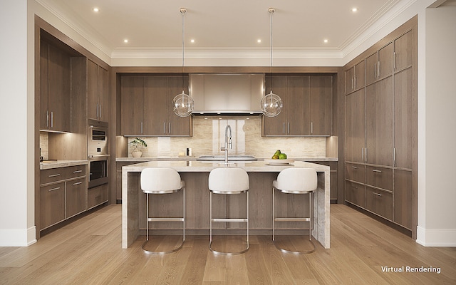 kitchen featuring light wood-type flooring, wall chimney exhaust hood, pendant lighting, and tasteful backsplash