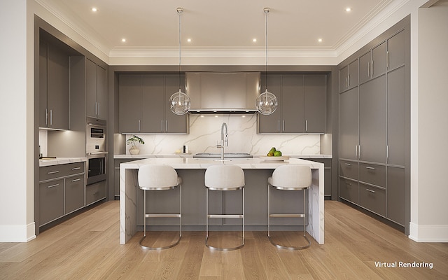 kitchen with decorative light fixtures, light hardwood / wood-style flooring, ornamental molding, and range hood