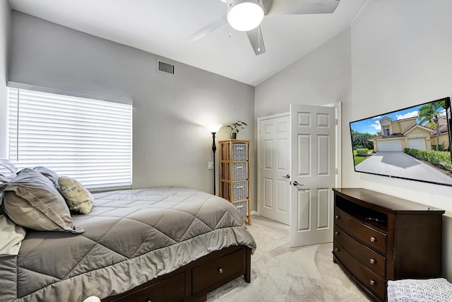 bedroom featuring high vaulted ceiling, ceiling fan, and light colored carpet